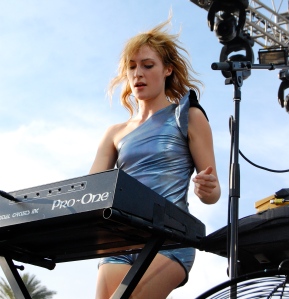 Emily Haines performing in what she calls a "superhero onesie."
